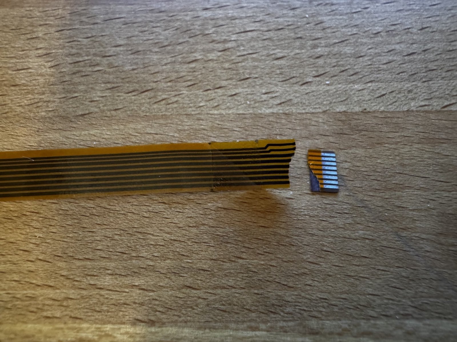 The broken flat flex cable The broken flat flex cable