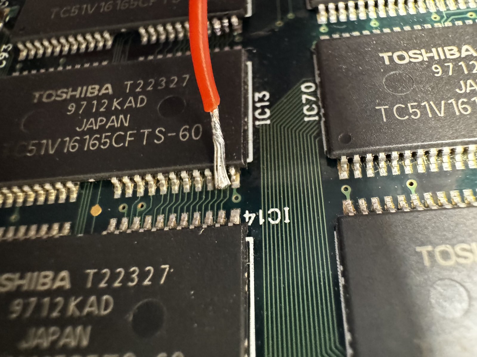 On pin 24 of the RAM chip. It took a few attempts, but the connection is right.