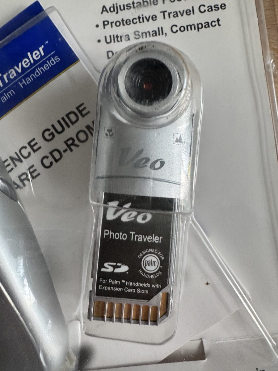 The camera itself: an SD card with a swivel lens for Palm handhelds with an expansion card slot