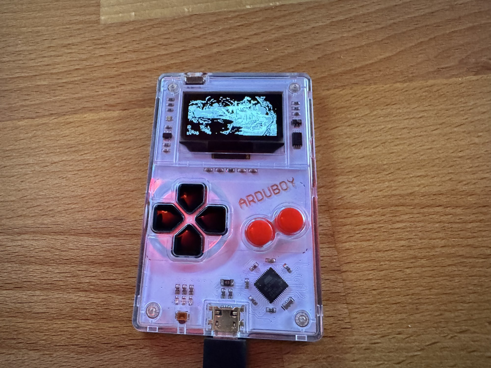 The Arduboy showing the ghost ship in the river of lava in an early greyscale test The Arduboy showing the ghost ship in the river of lava in an early greyscale test